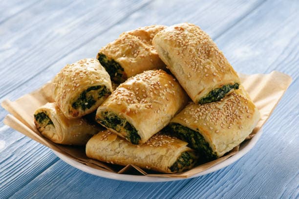 Savory Spinach and Feta Stuffed Breads: A Delicious Recipe.